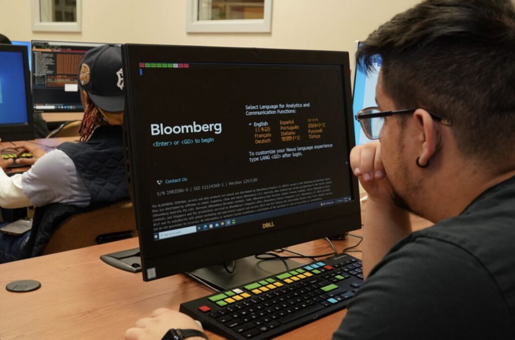 ECC students work in the Bloomberg Lab in 2023. The College’s teams are competing again in the 2025 Bloomberg Global Trading Challenge.